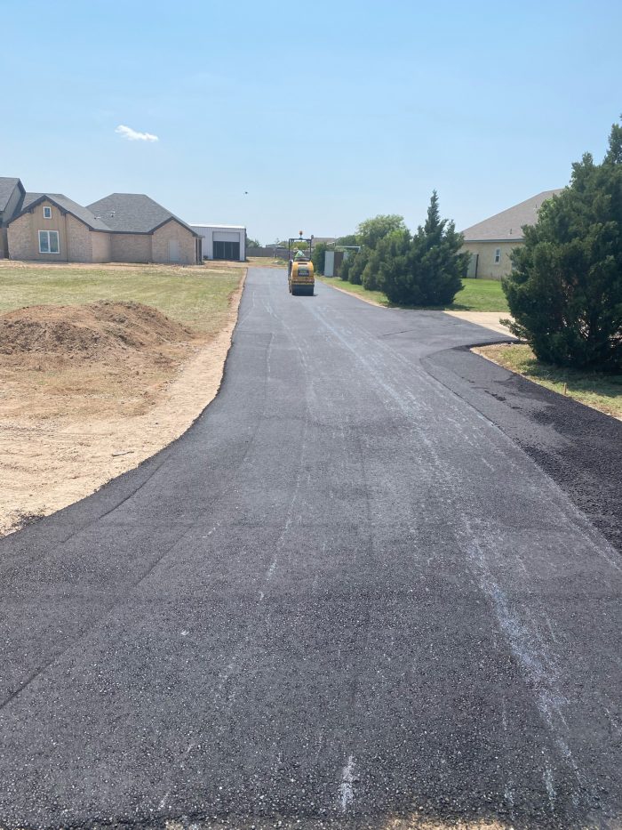 Oil City Paving crew asphalt resurfacing